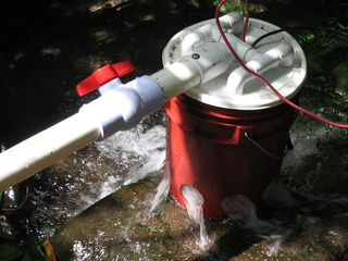 Illustration for article titled Hydroelectric Bucket Will Gladly Help You Miss the Point of Camping